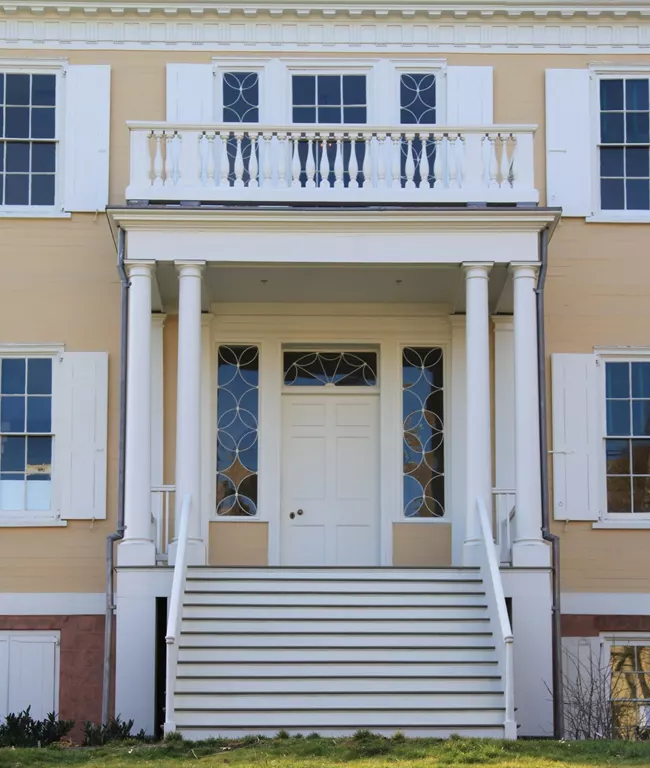 The semi-elliptical fanlight is the Federal style's signature
