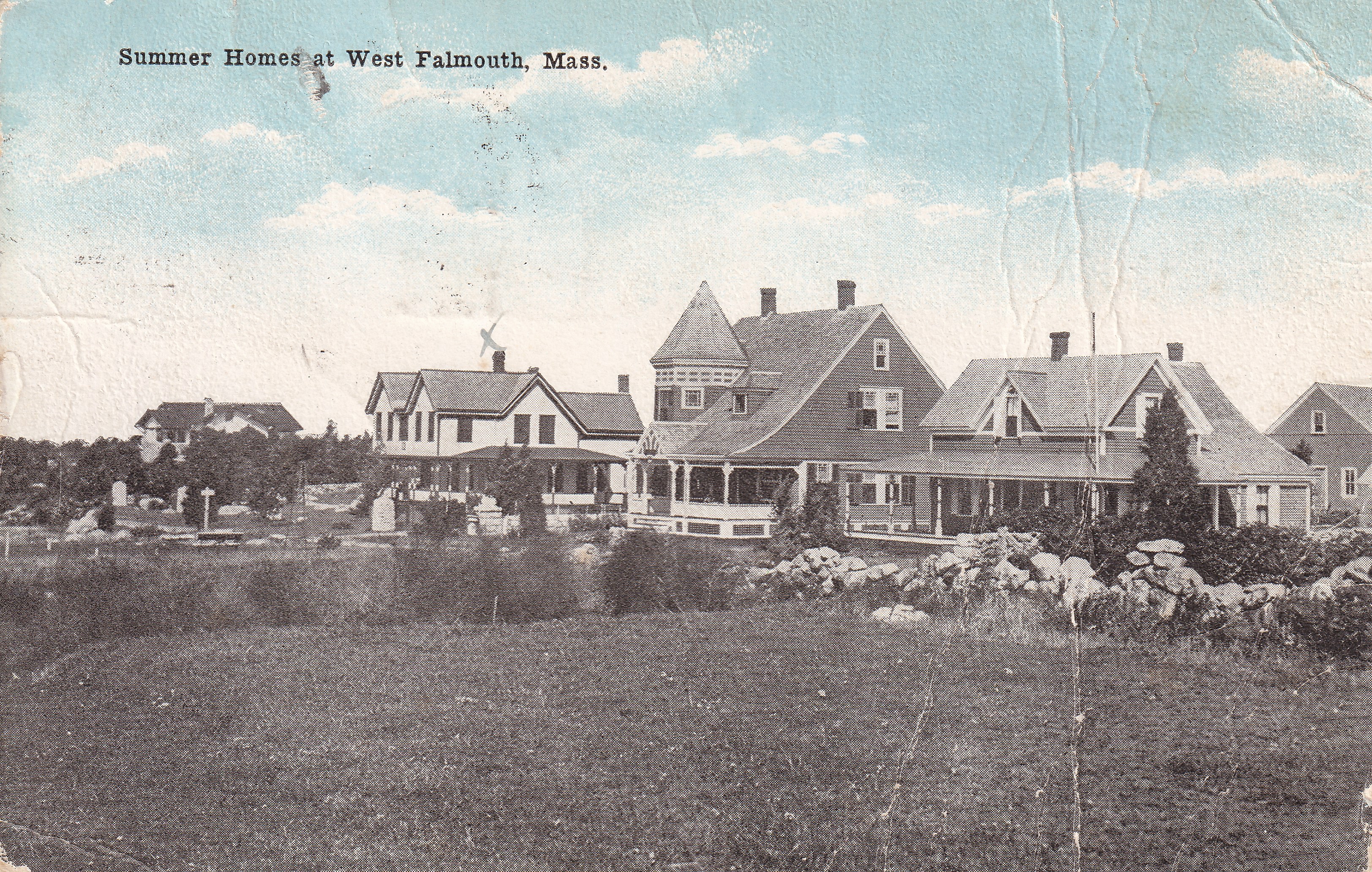 A Queen Anne mansion with corner tower and asymmetric massing