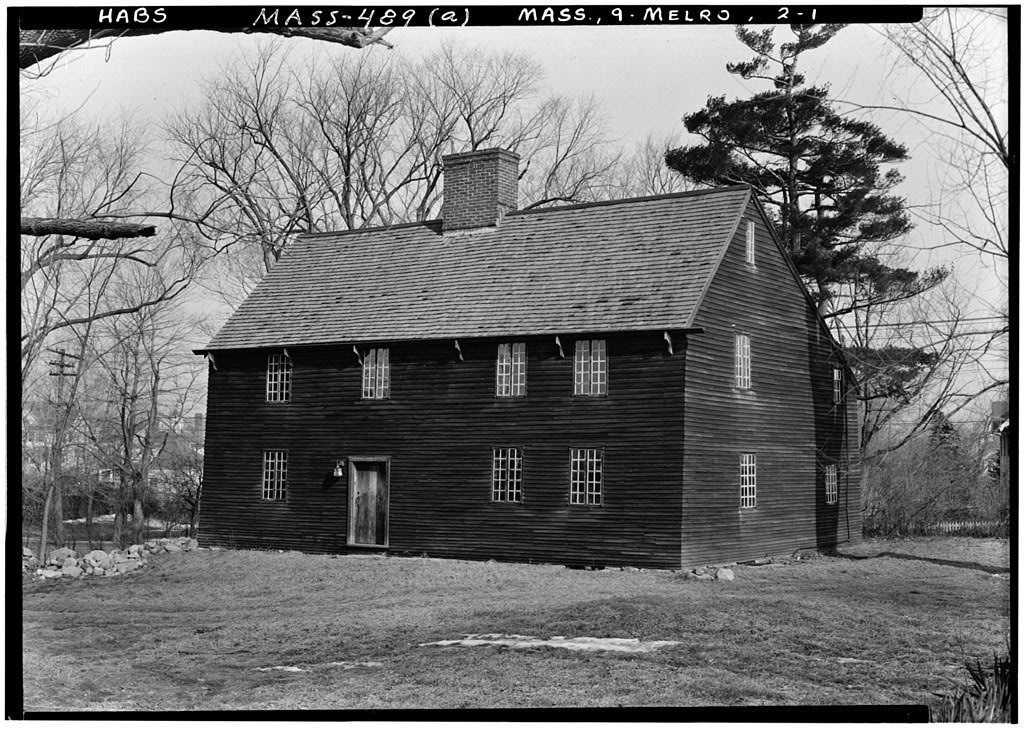 The single long sweeping rear roof slope is the Saltbox signature