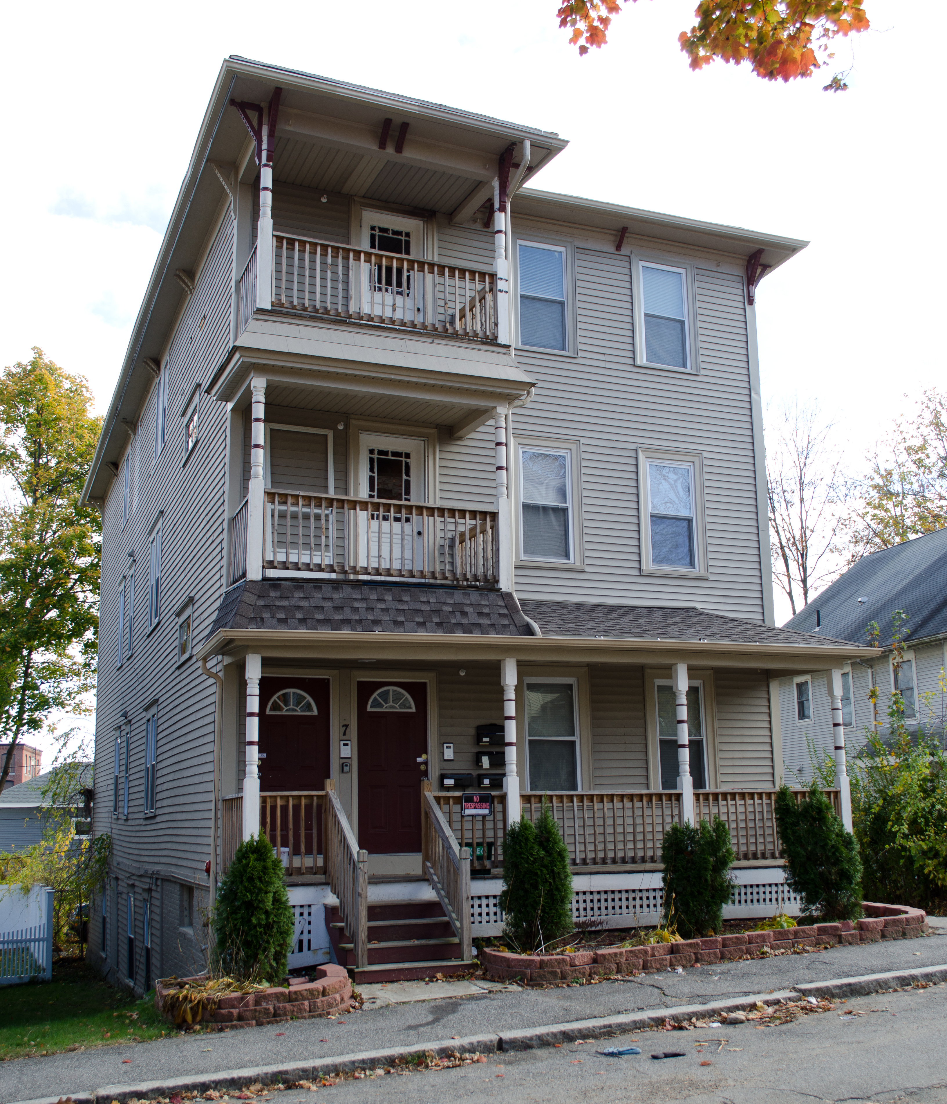 A Boston-area Triple Decker with stacked piazzas